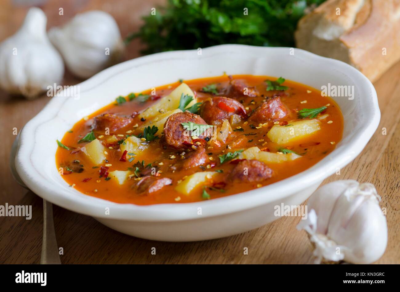Spanish potato, garlic and chorizo soup. Stock Photo
