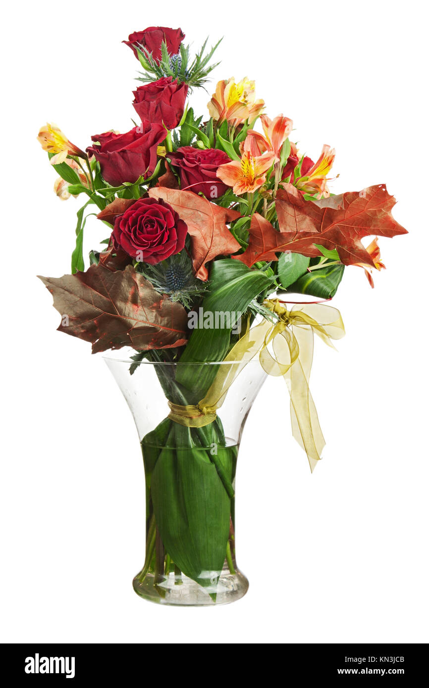 Floral bouquet of roses and lilies arrangement centerpiece in vase