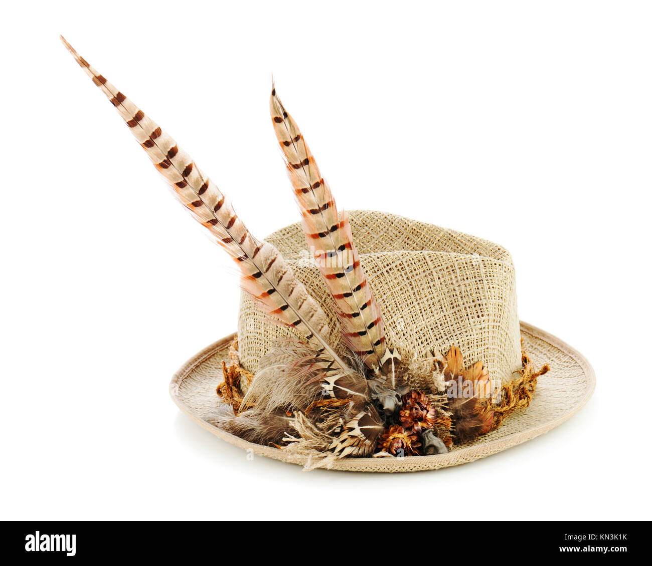 Hunting hat with pheasant feathers isolated on white. Closeup Stock