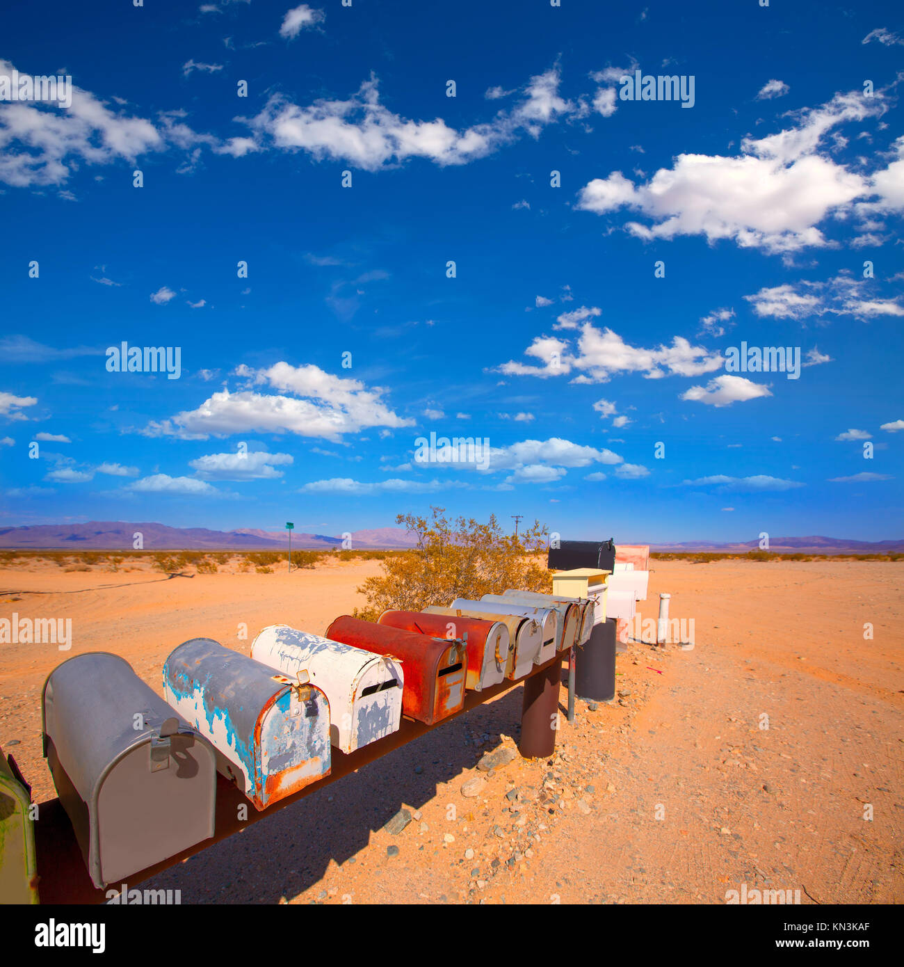 Grunge mail boxes in a row at California Mohave desert USA Stock Photo