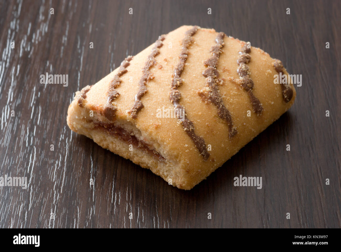 Cookie with chocolate on the black table. Stock Photo
