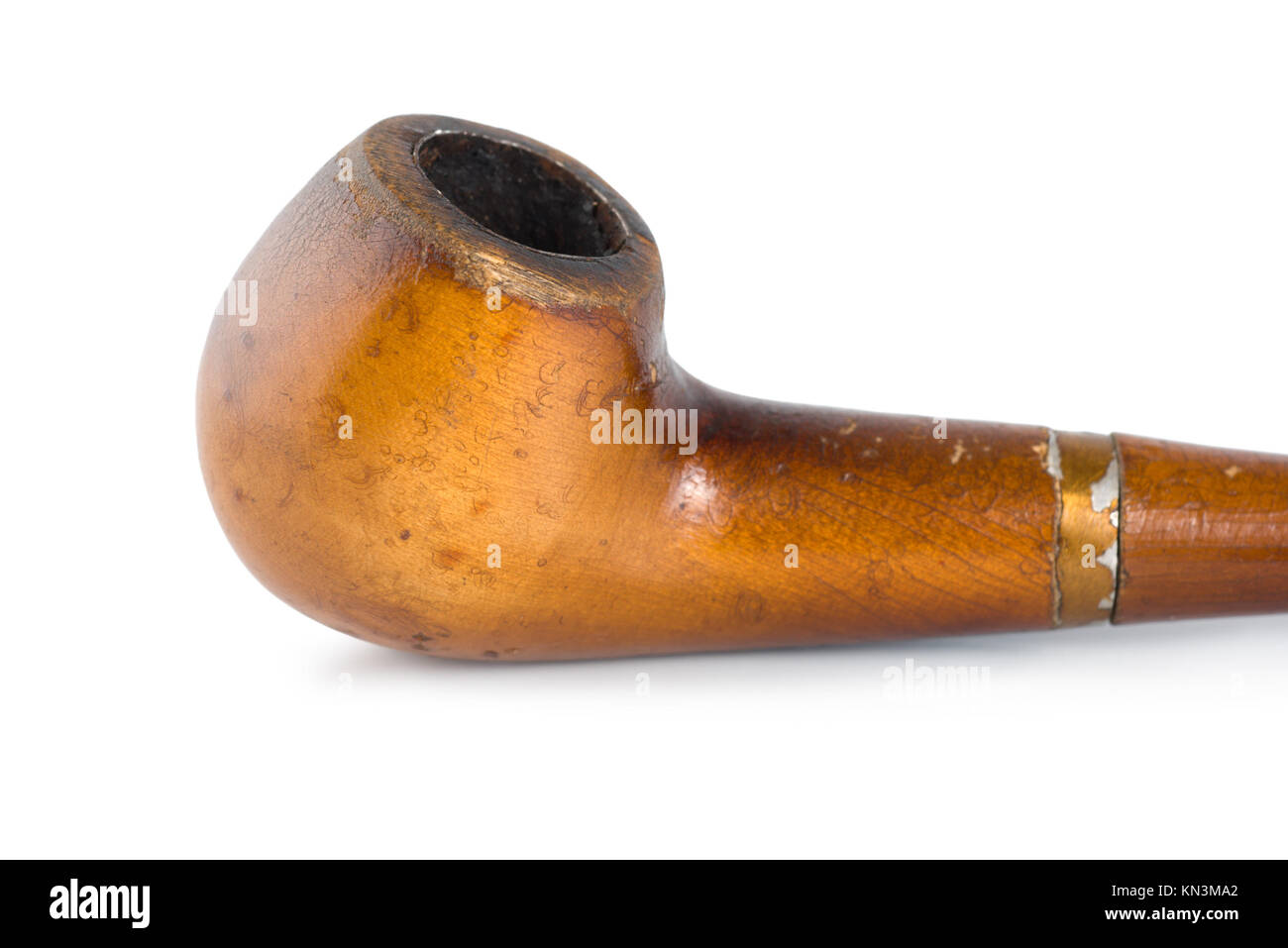 The old smoking pipe isolated on white background. Stock Photo