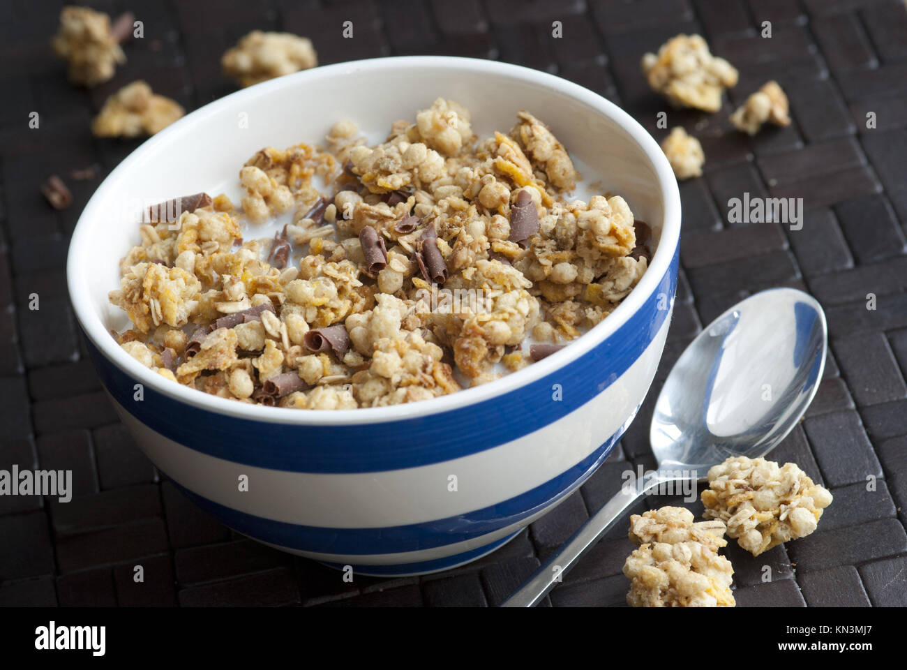 Crunchy nut clusters with chocolate chips in a bowl Stock Photo - Alamy