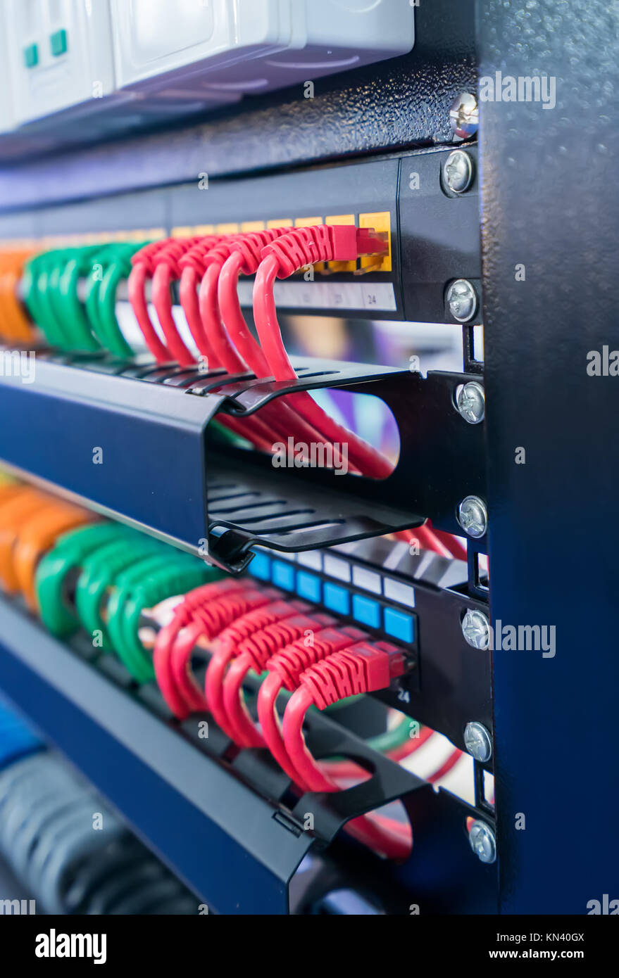 Server rack with internet patch cord cables connected to patch panel in  server room Stock Photo - Alamy