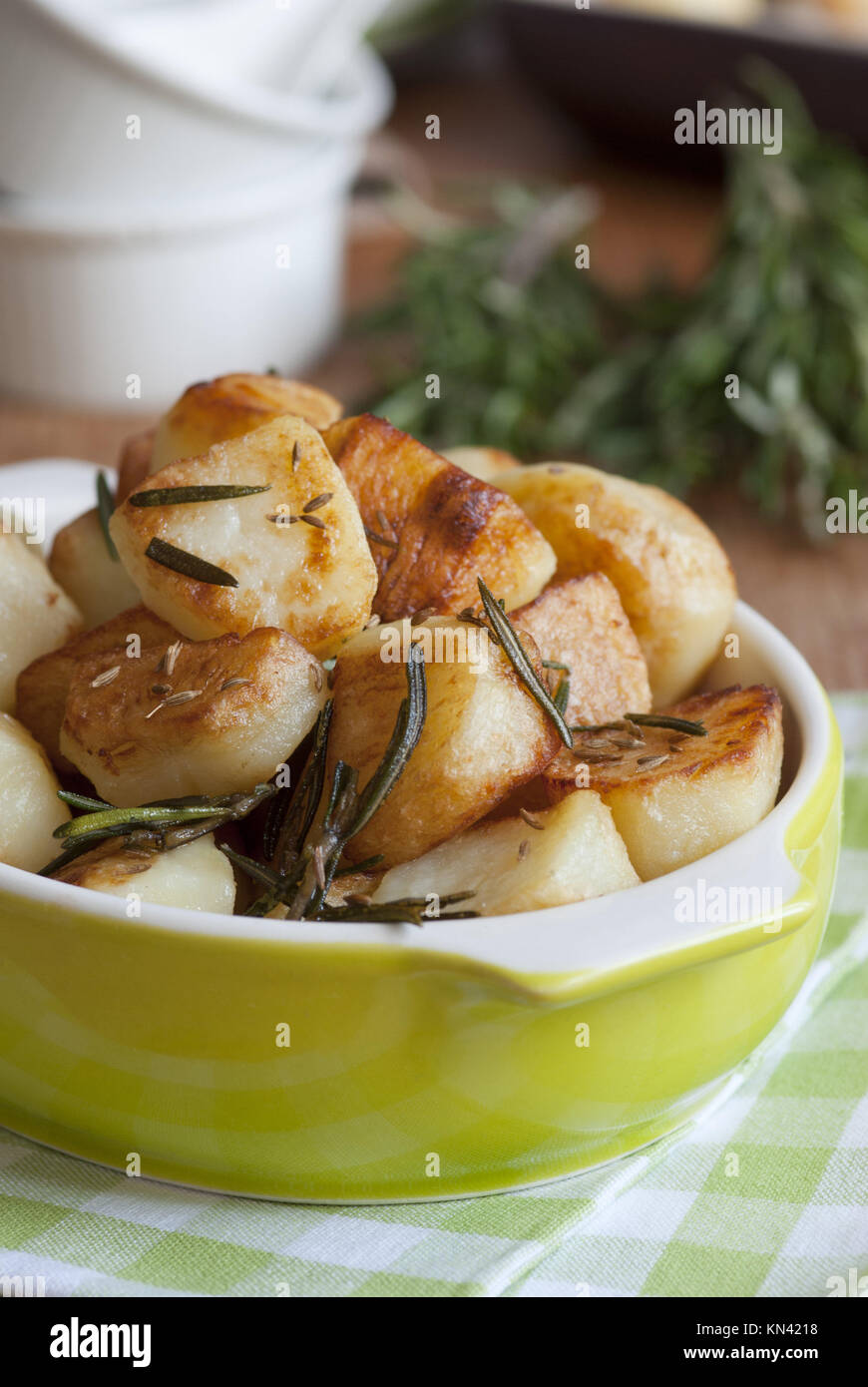 Roast potatoes with rosemary and cumin seeds Stock Photo Alamy