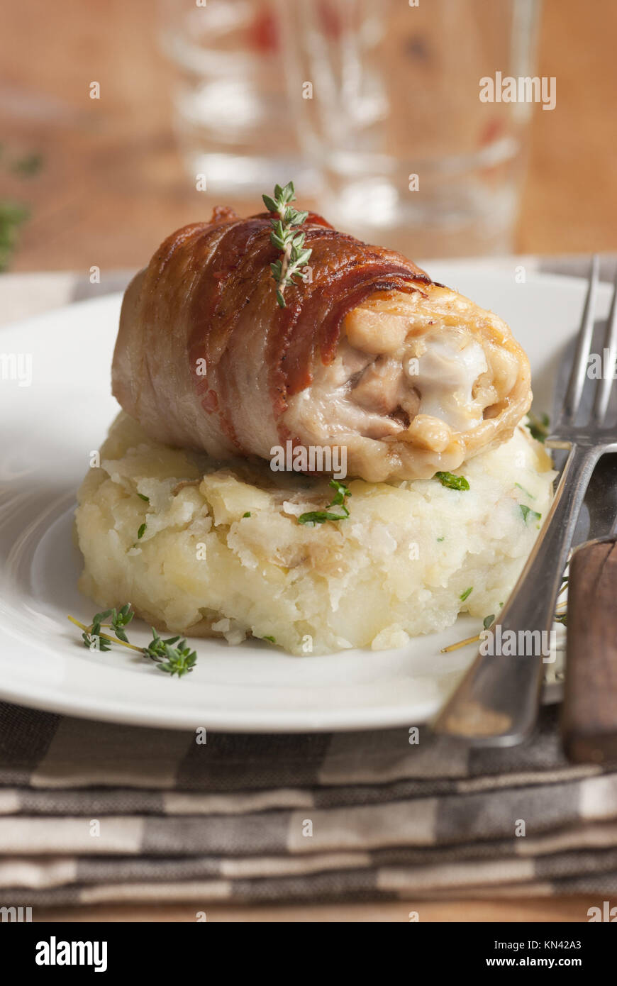 Chicken thighs wrapped in Pancetta with crushed new potatoes Stock
