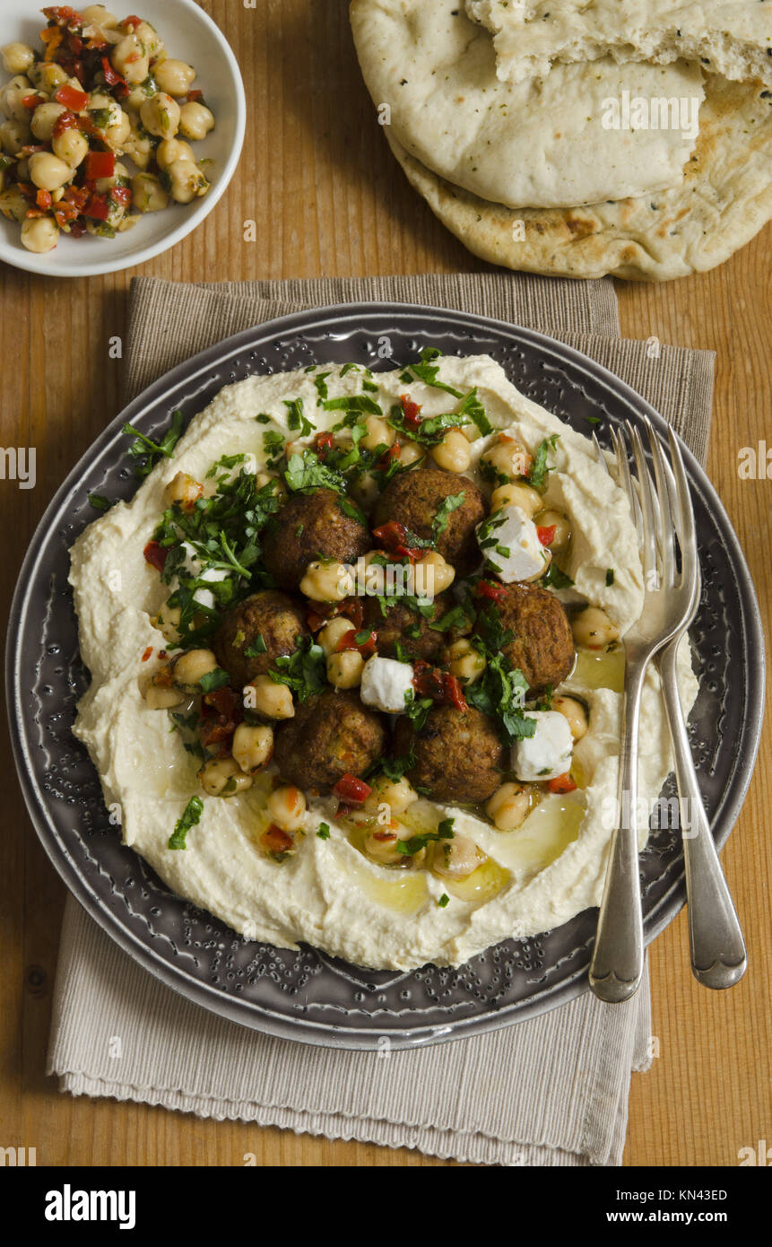 Hummus with falafel, feta cheese and chickpeas Stock Photo Alamy