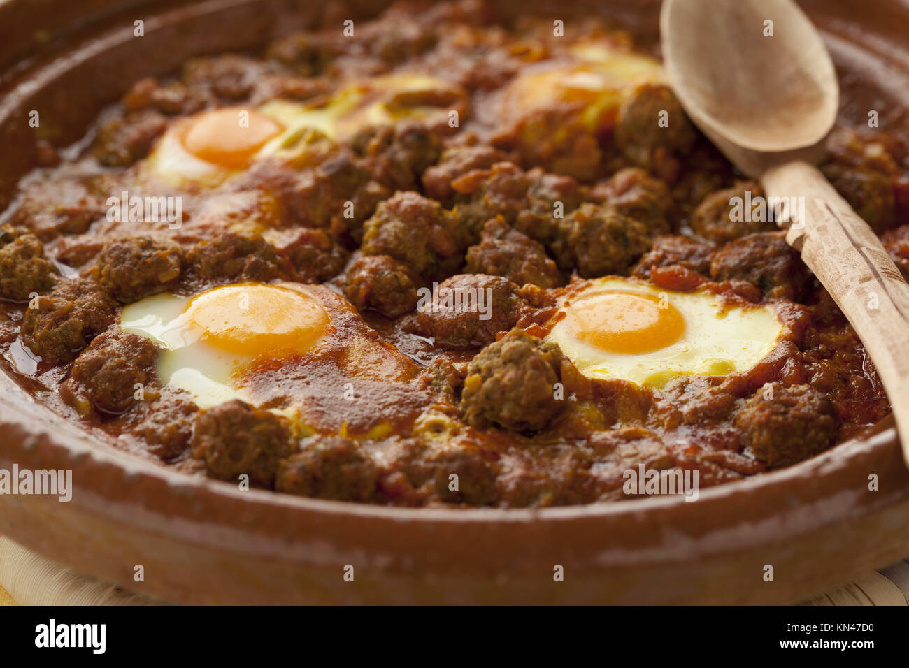 Moroccan kefta tagine with eggs (Mkaouara) close up Stock Photo Alamy