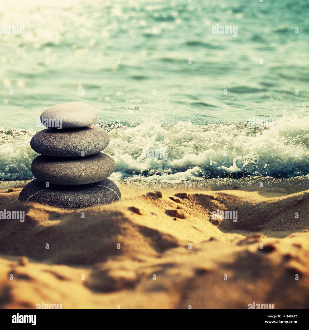 Pebble on the sand, abstract tranquil scene. Stock Photo