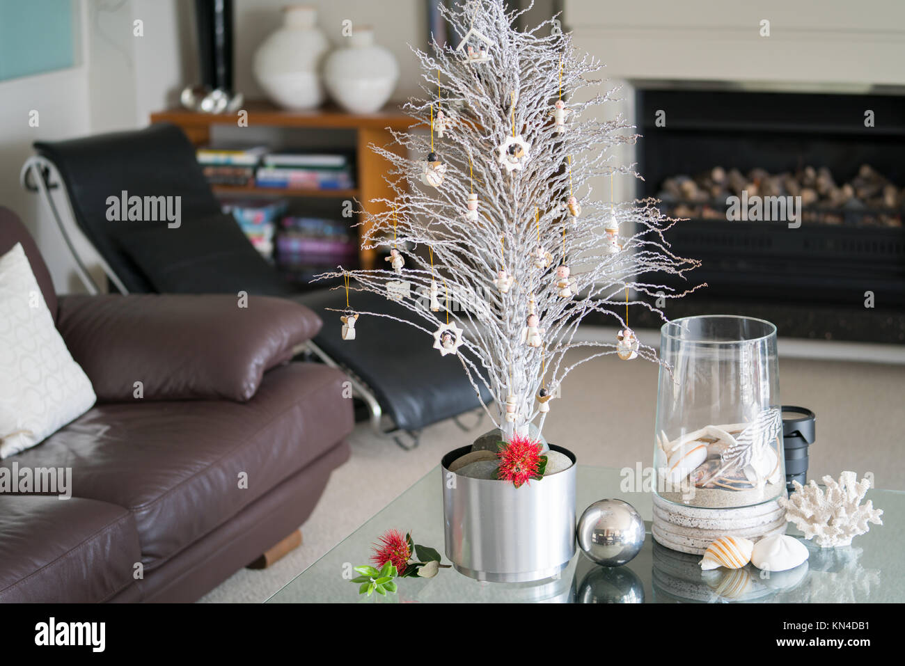 Simple summer New Zealand theme Christmas small white tree on glass