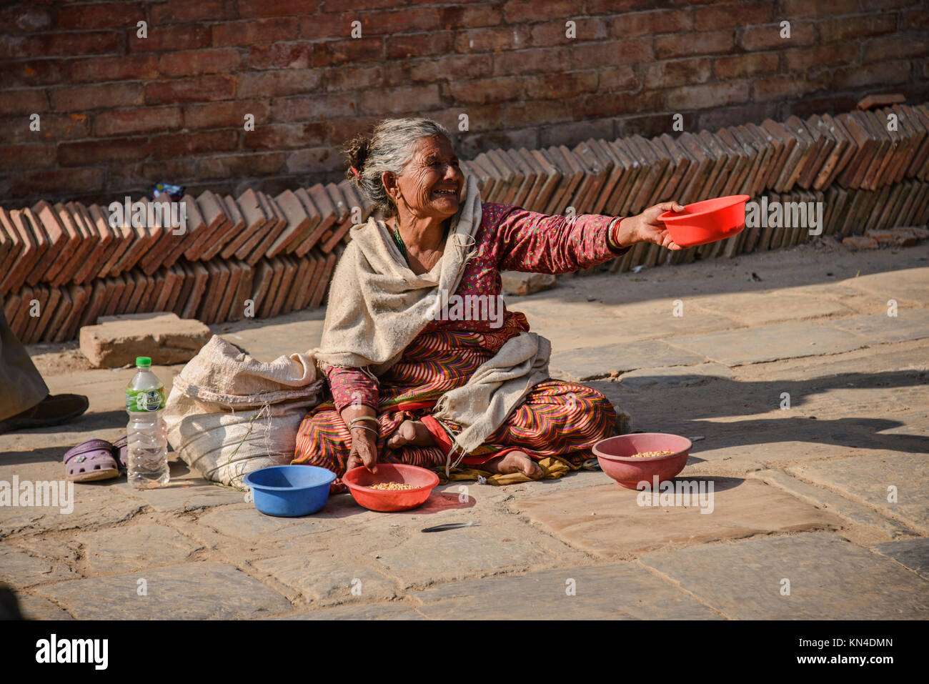 A beggar in Durbar Square, Kathmandu, Nepal Stock Photo