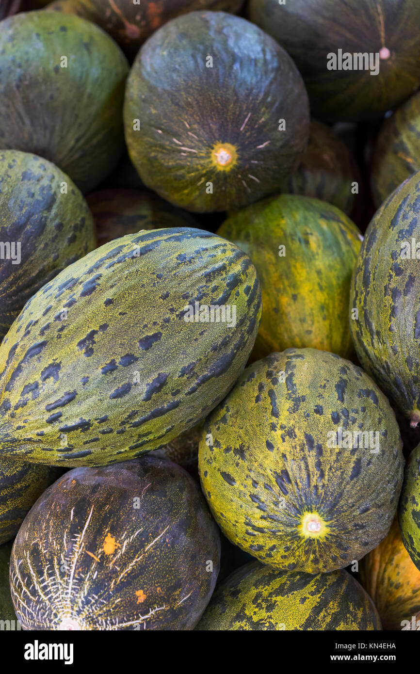 Background of ripe melons close-up on the market Stock Photo - Alamy