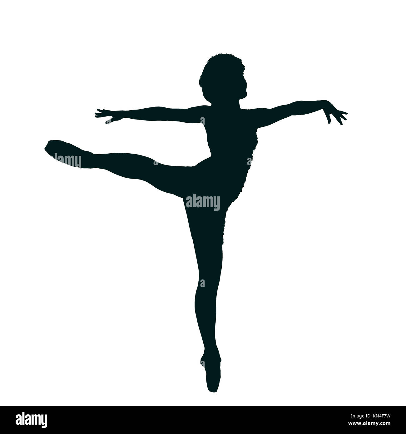 Silhouette of a female Ballet Dancer balances on her toes Stock Photo