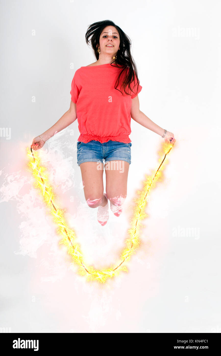 Digitally enhanced image of a female teen Skips Rope with a flaming ...