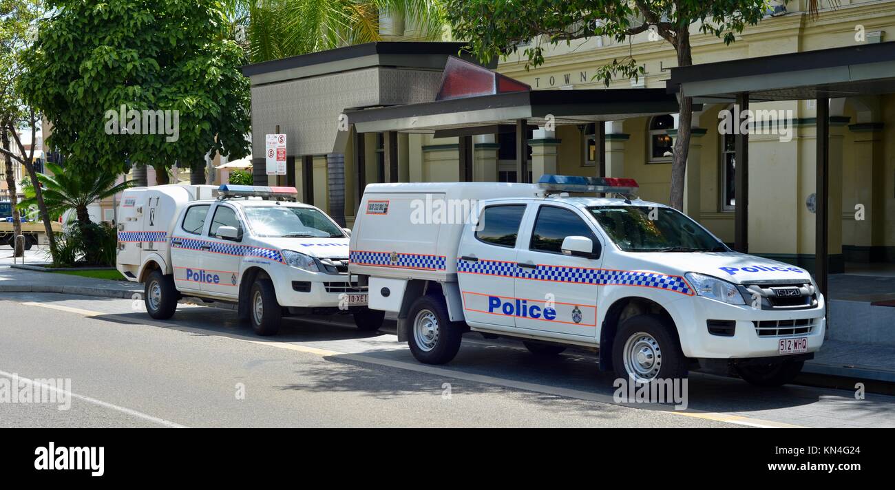Police twin cab utes parked on Flinders street after an altercation, Townsville, Queensland, Australia Stock Photo