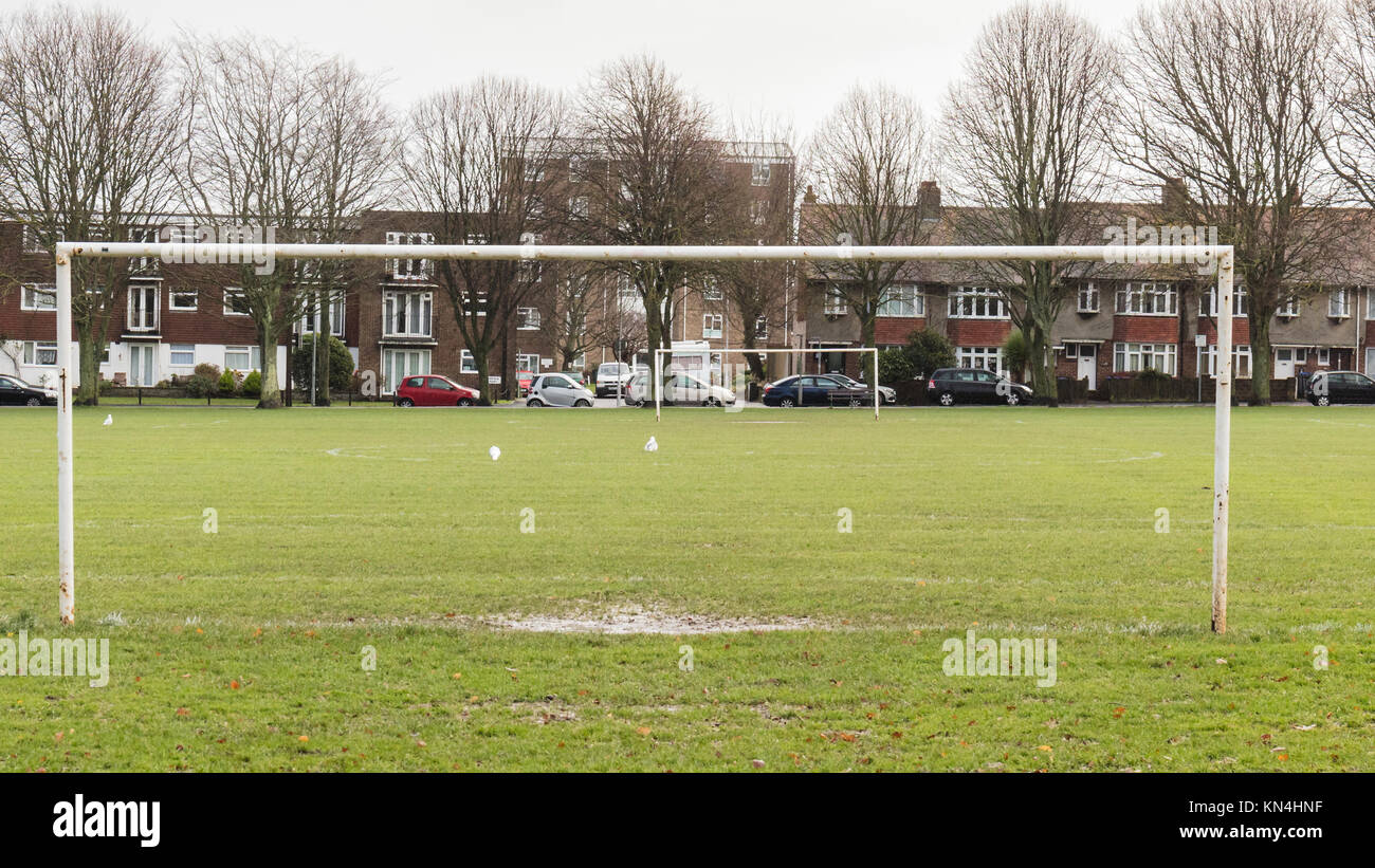 Waterlogged Football Pitch.  Muddy Puddle in Goalmouth Stock Photo