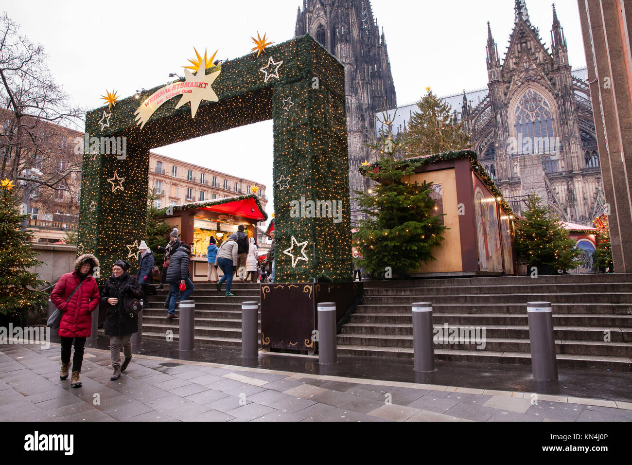 Germany, Cologne, newly mounted concrete bollards as protection against terrorist attacks with vehicles at the Christmas market at the cathedral.  Deu Stock Photo