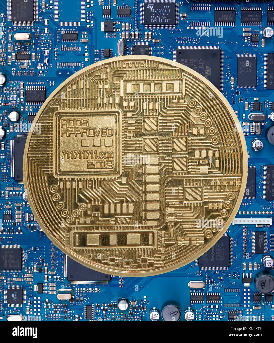 Symbol image digital currency, reverse side of a bitcoin on a blue plantine Stock Photo