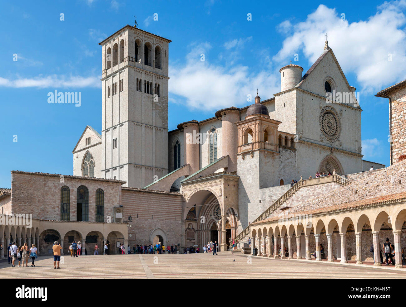 The Basilica di San Francesco (The Basilica of St Francis of Assisi) from the Piazza Inferiore di San Francesco, Assisi, Umbria, Italy Stock Photo