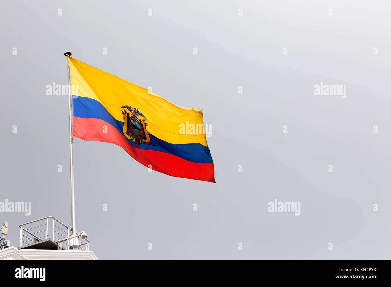 Ecuador Flag flying from the Presidential Palace, Plaza Grande, Quito, Ecuador, South America Stock Photo