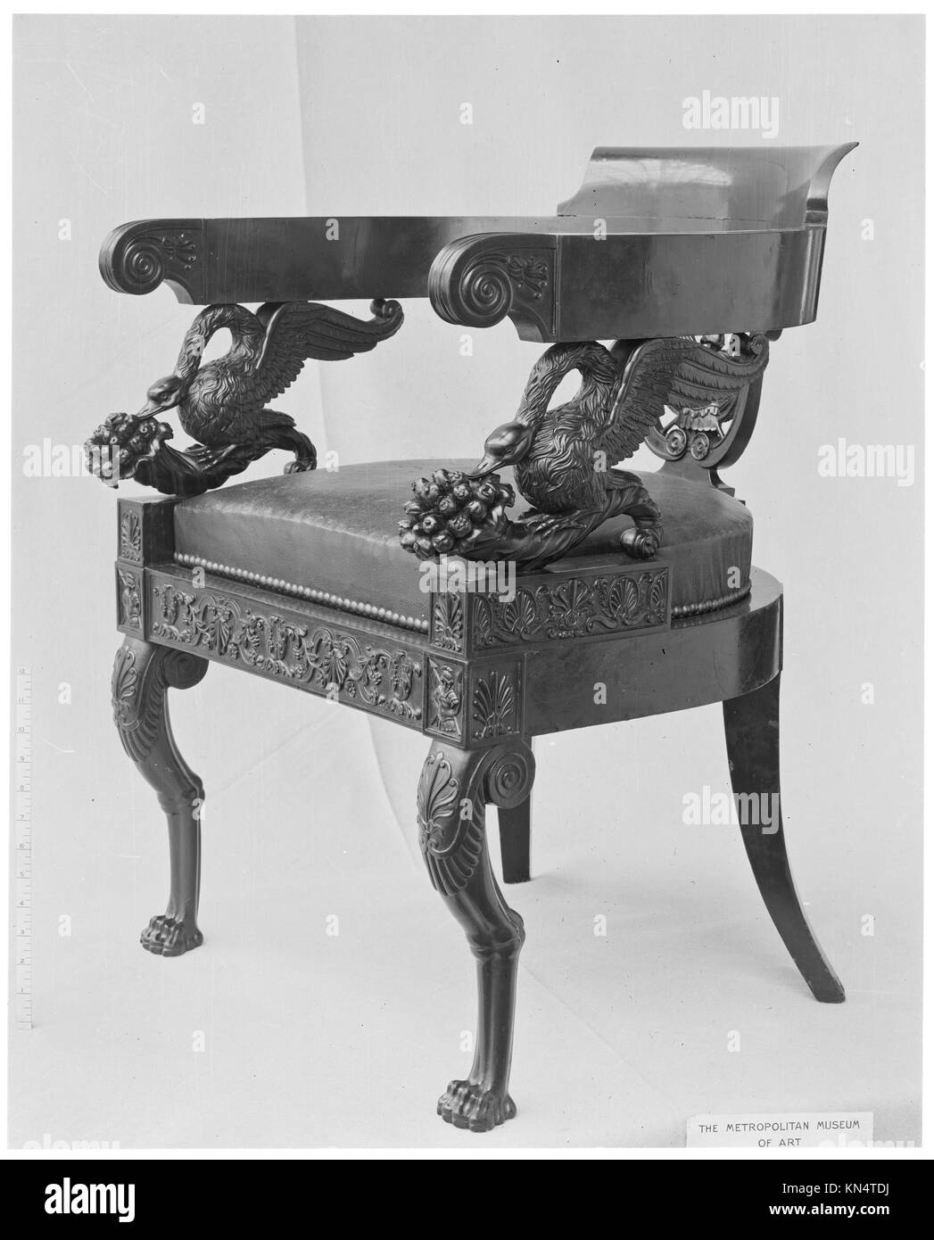 Armchair MET 3351 190613 Italian, Armchair, ca. 1830, Mahogany veneer on walnut, 30 1/4 ? 22 3/4 in. (76.8 ? 57.8 cm). The Metropolitan Museum of Art, New York. Rogers Fund, 1908 (08.51.18) Stock Photo