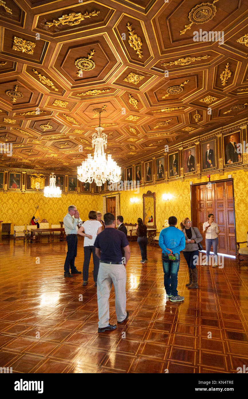 Presidential Palace, Quito, Ecuador interior- tourists on a guided tour in the Salon de los Presidentes; Quito, Ecuador, South America Stock Photo