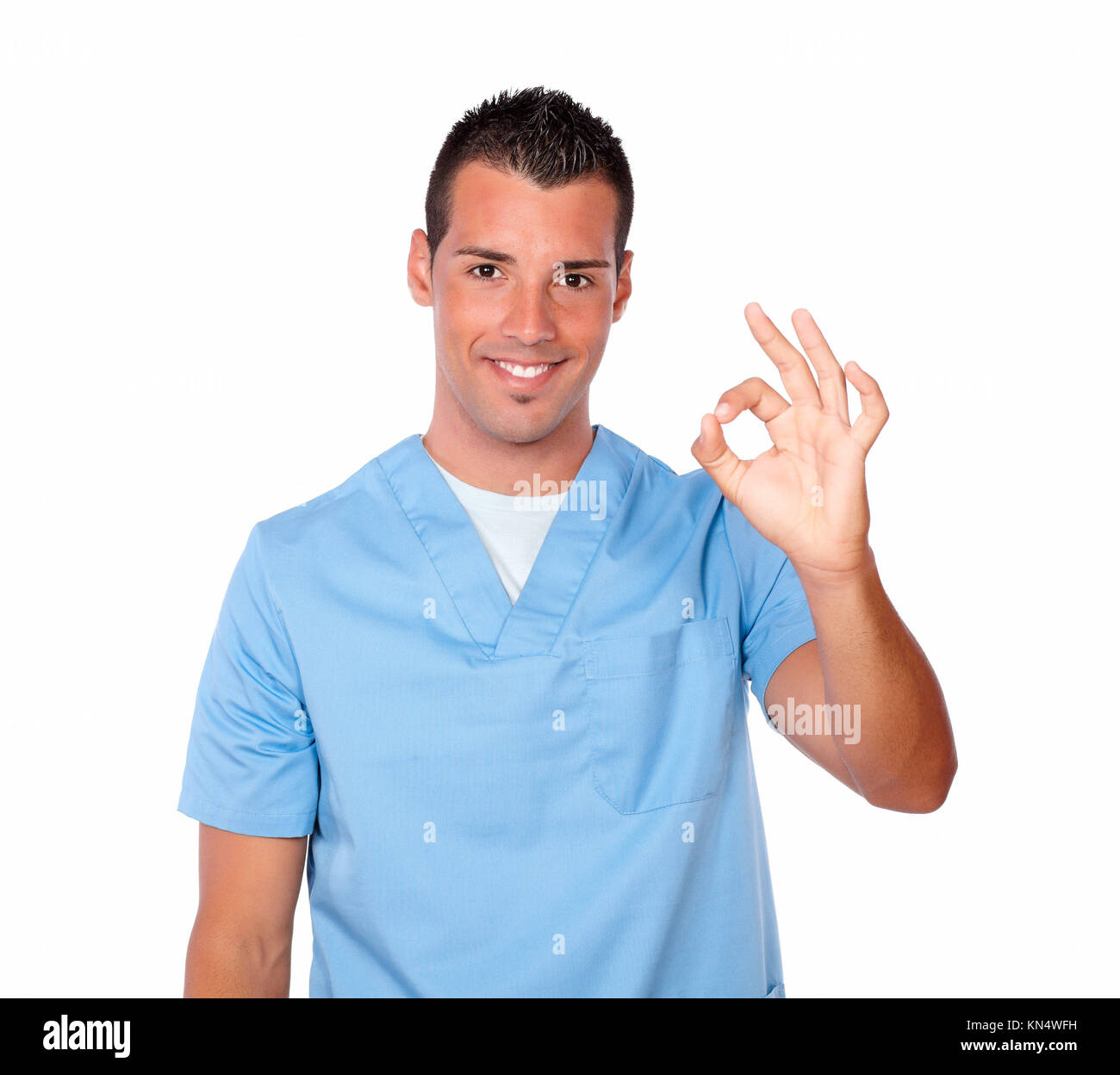 https://c8.alamy.com/comp/KN4WFH/portrait-of-handsome-latin-nurse-on-blue-medical-uniform-with-ok-sign-KN4WFH.jpg