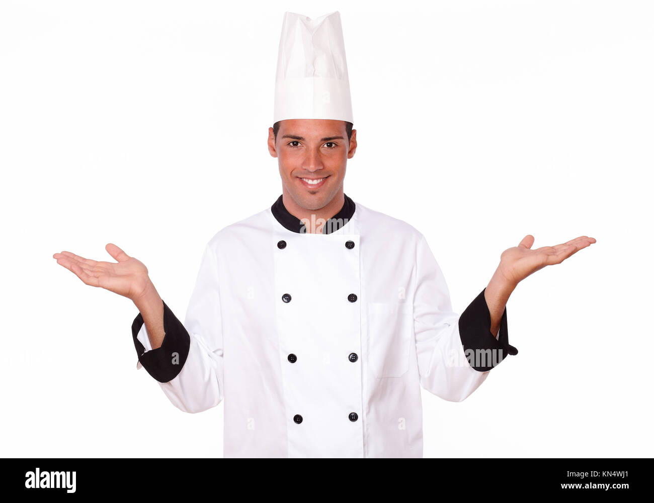 Portrait Of Professional Latin Chef On White Uniform Holding Up His Palms While Smiling At You On Isolated Background Copyspace Stock Photo Alamy