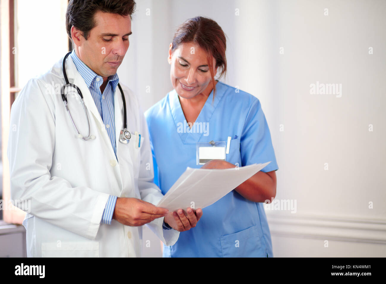 Latin couple working as nurse hi-res stock photography and images - Alamy