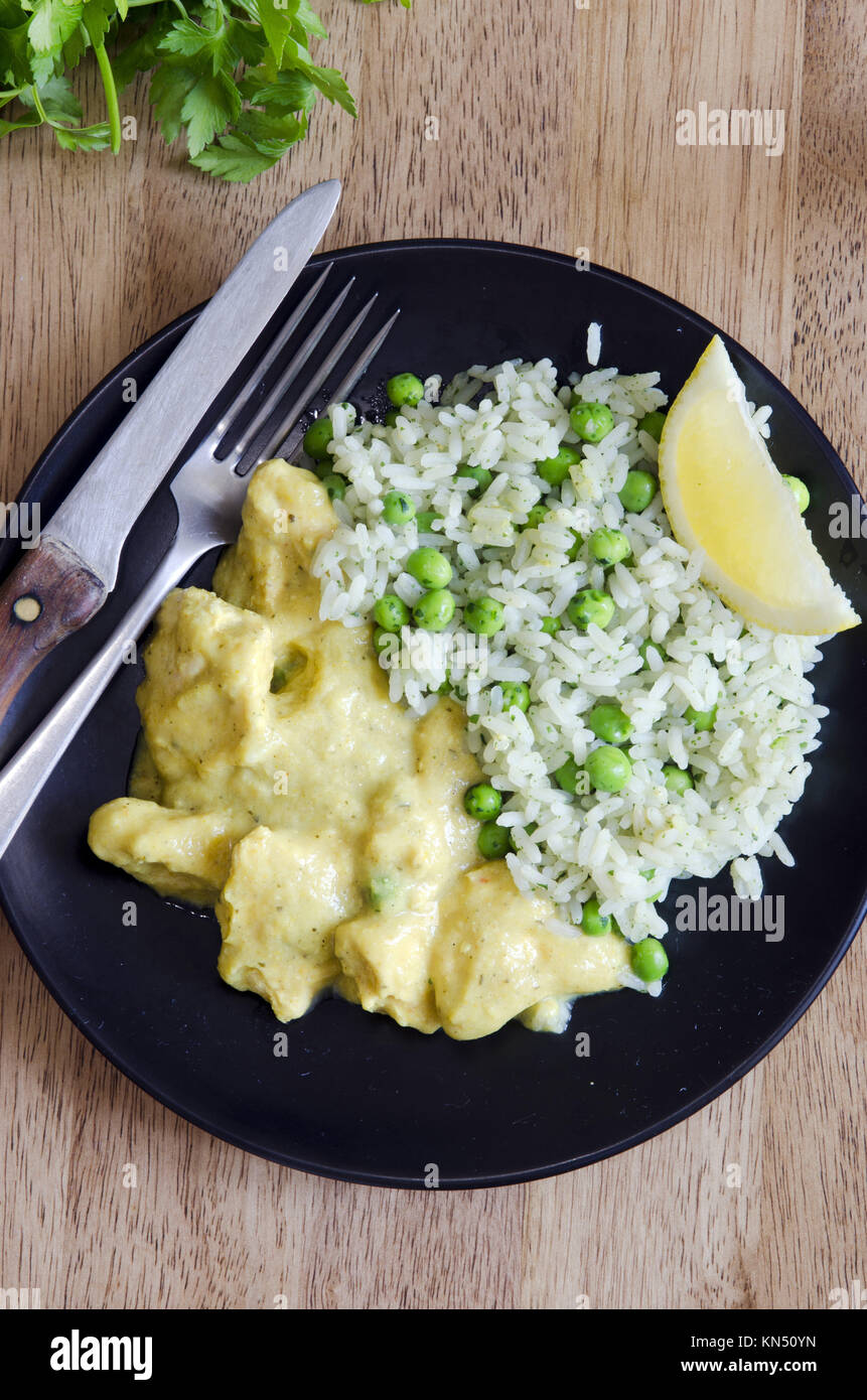 Lemon and ginger chicken curry with pilaf Stock Photo Alamy