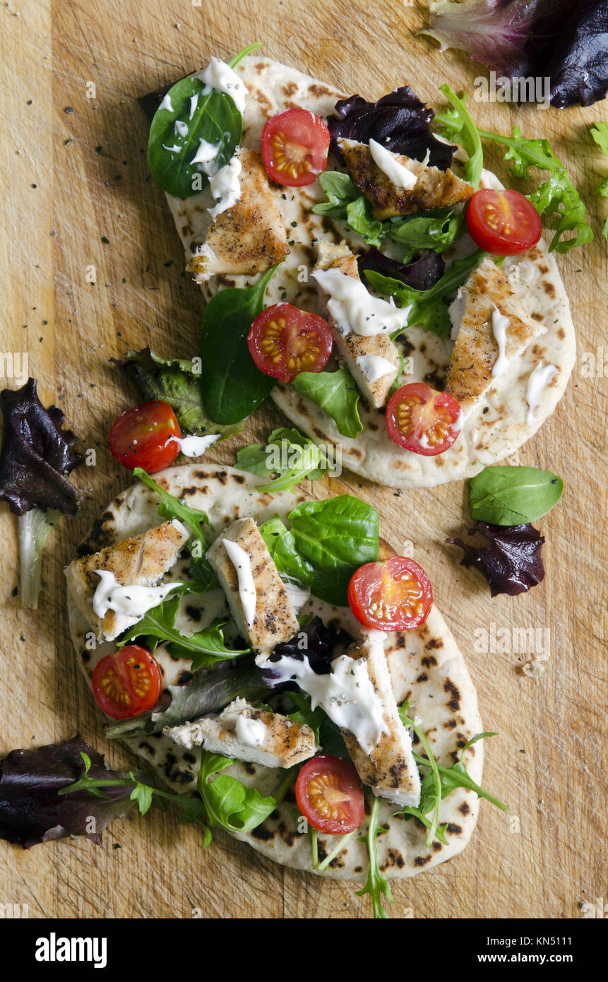 Grilled chicken with salad on pitta bread Stock Photo - Alamy