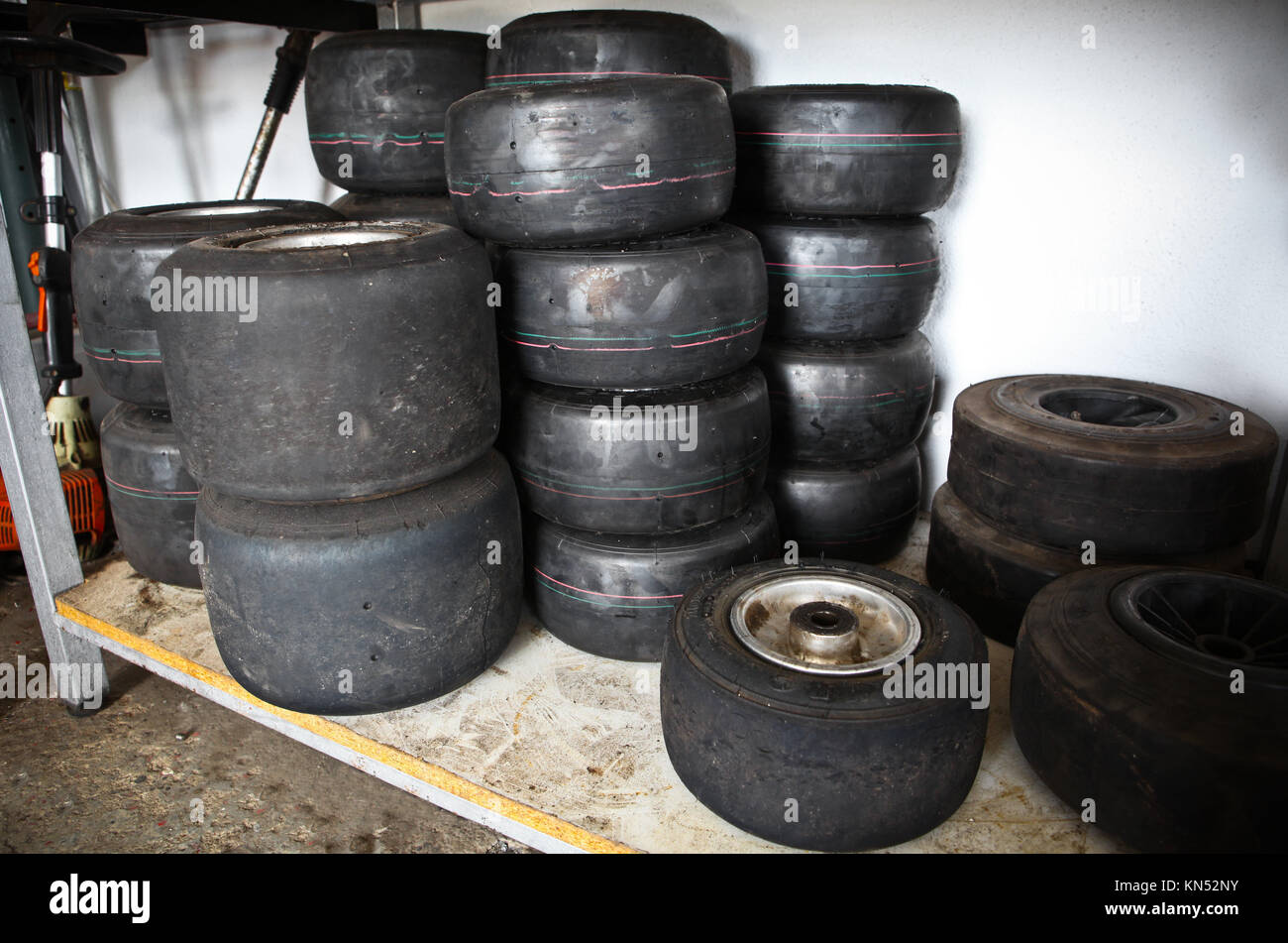 Loads of Karts wheels and tires after competition. Karting circuit workshop. Stock Photo