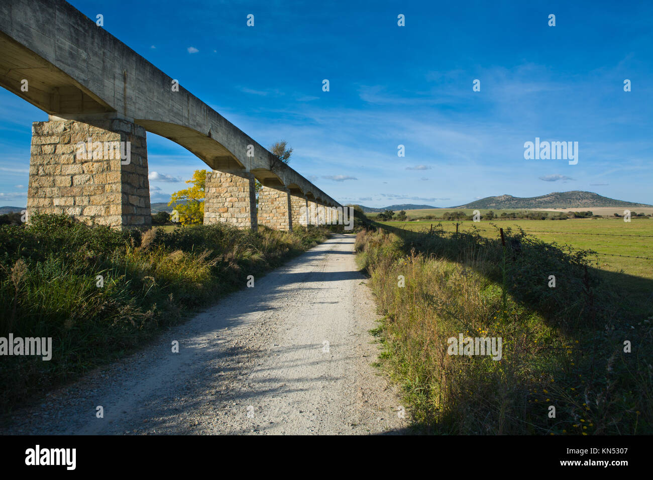 View of a irrigation canal built in concrete and stone, Valdesalor, Caceres, Spain. Stock Photo