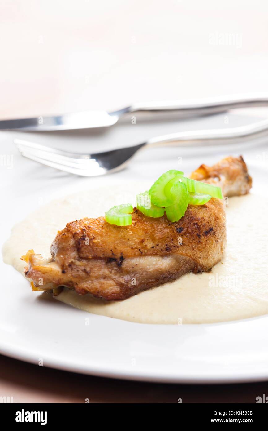 chicken leg with celery sauce Stock Photo Alamy