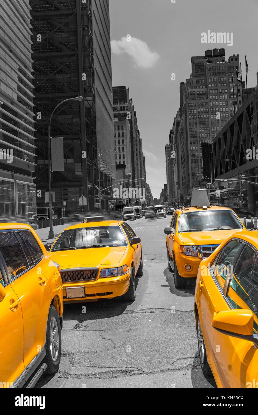 Times Square New York yellow cab taxi daylight US. Stock Photo