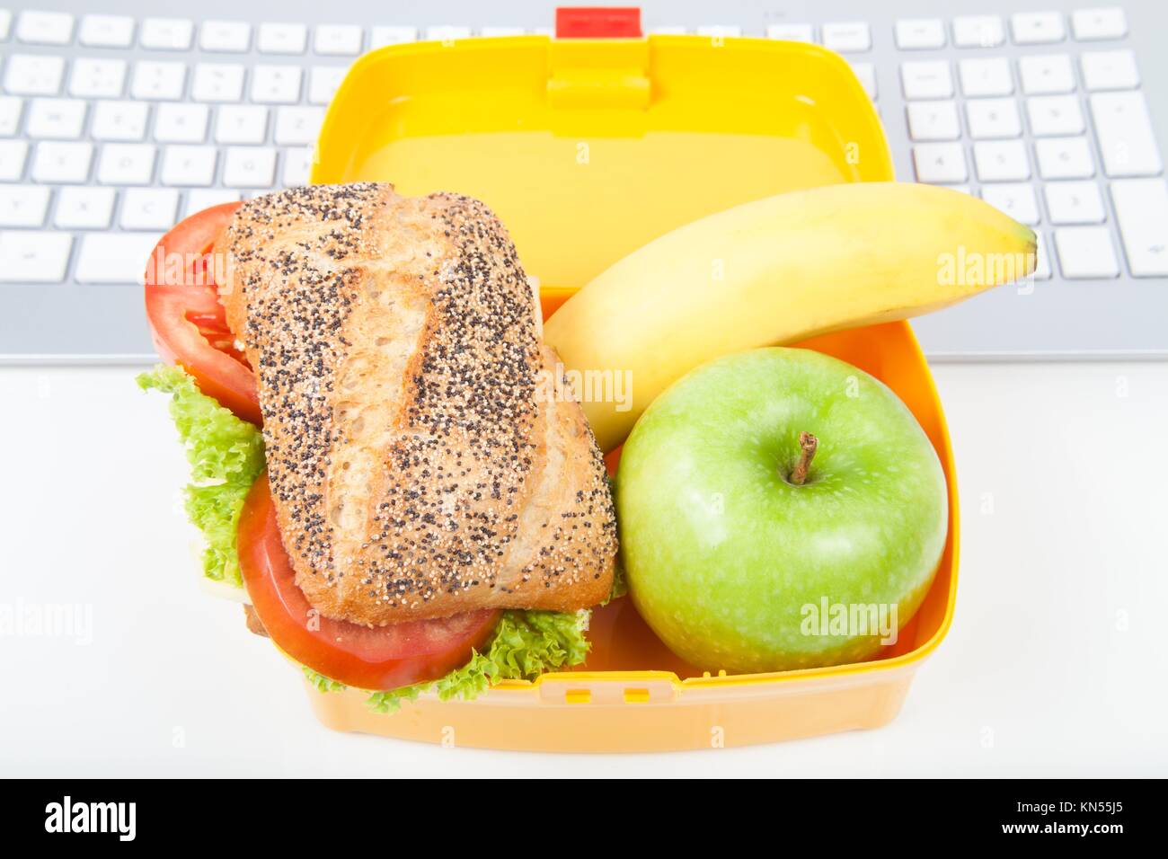 lunch box with sandwich, apple and banana Stock Photo Alamy
