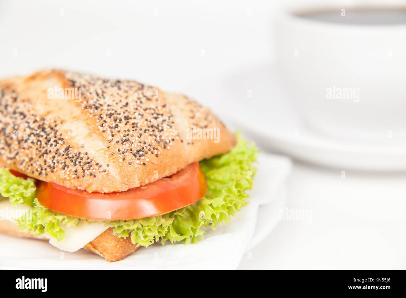breakfast with sandwich and coffee. Stock Photo