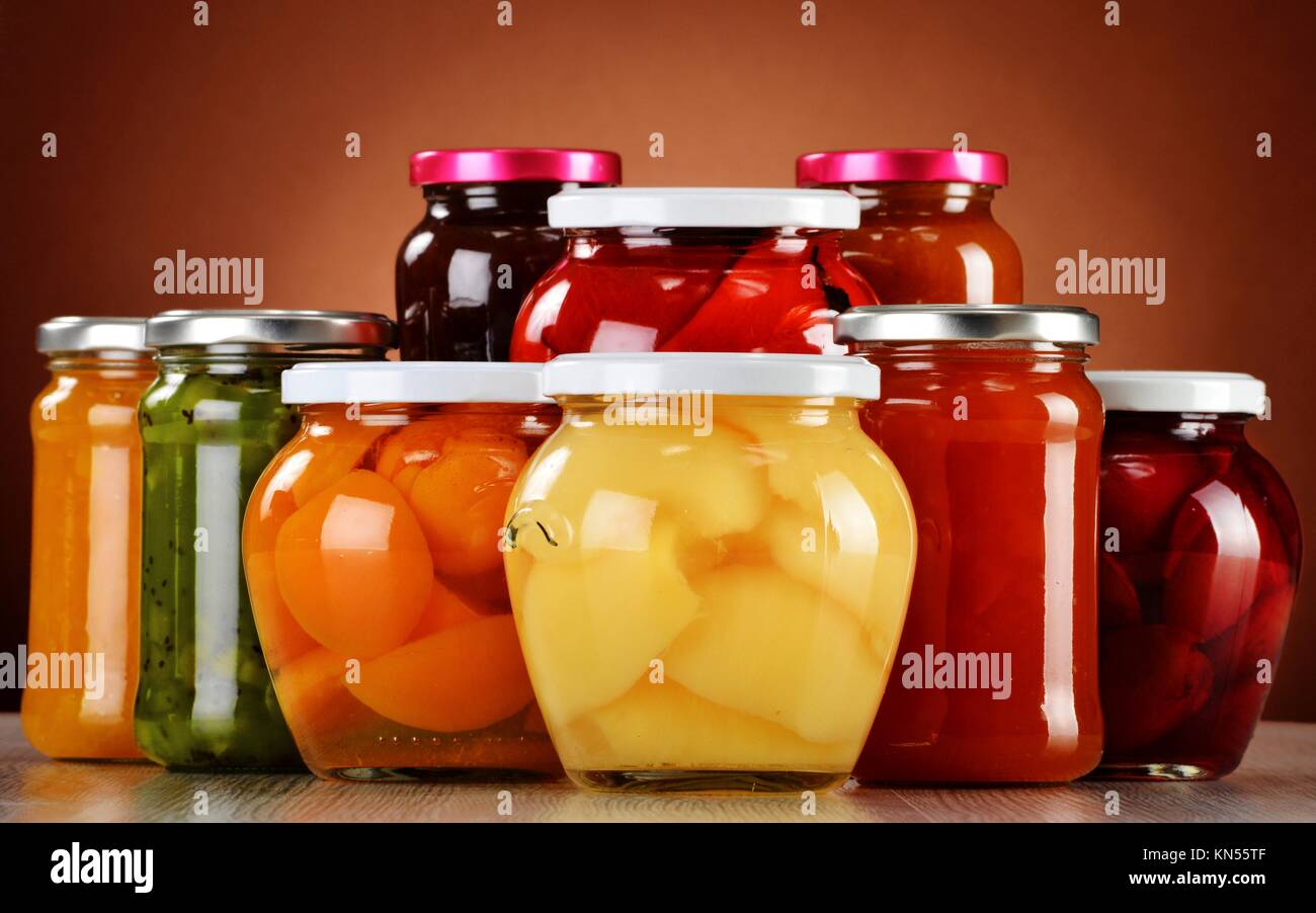 Jars with fruity compotes and jams. Preserved fruits Stock Photo Alamy