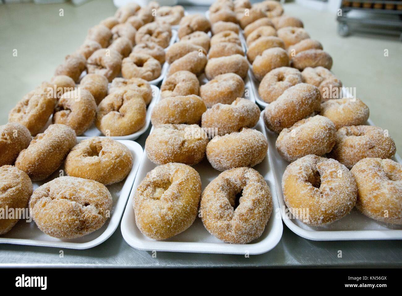 Trays of spanish typical fried donuts or roscas fritas. Stock Photo