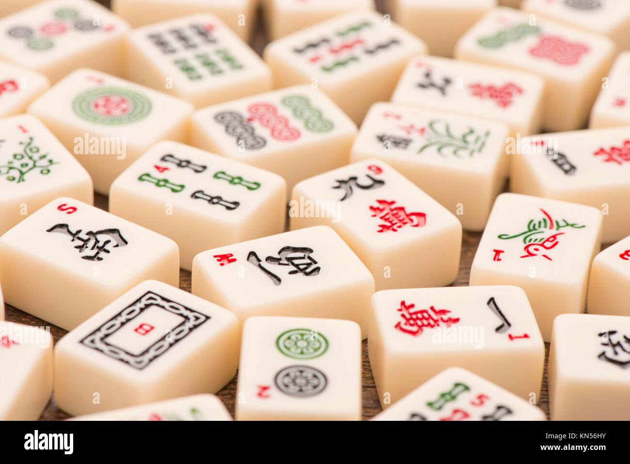 Playing the chinese board game of mahjong hires stock photography and