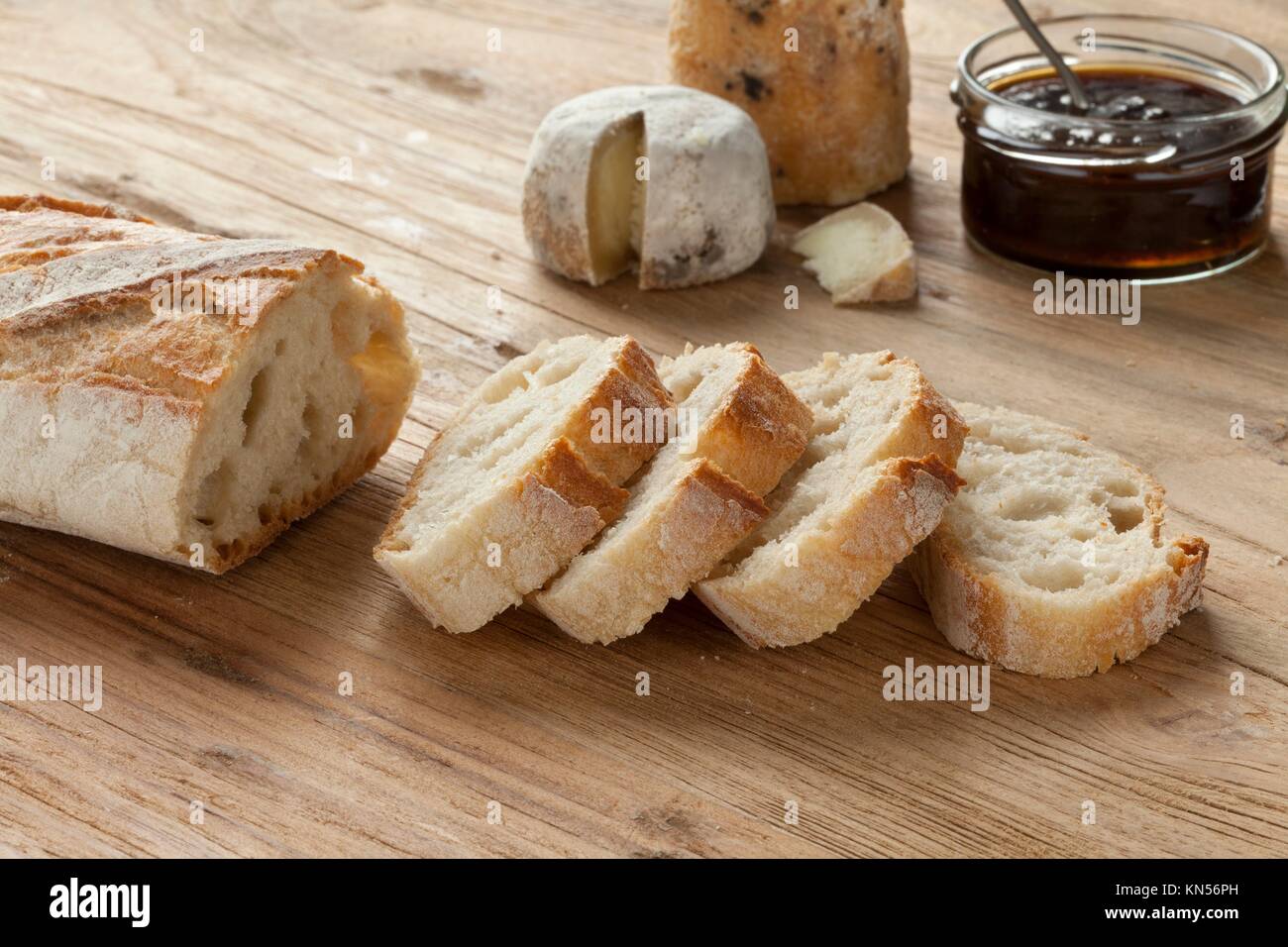 Traditional authentic French baquette in slices. Stock Photo