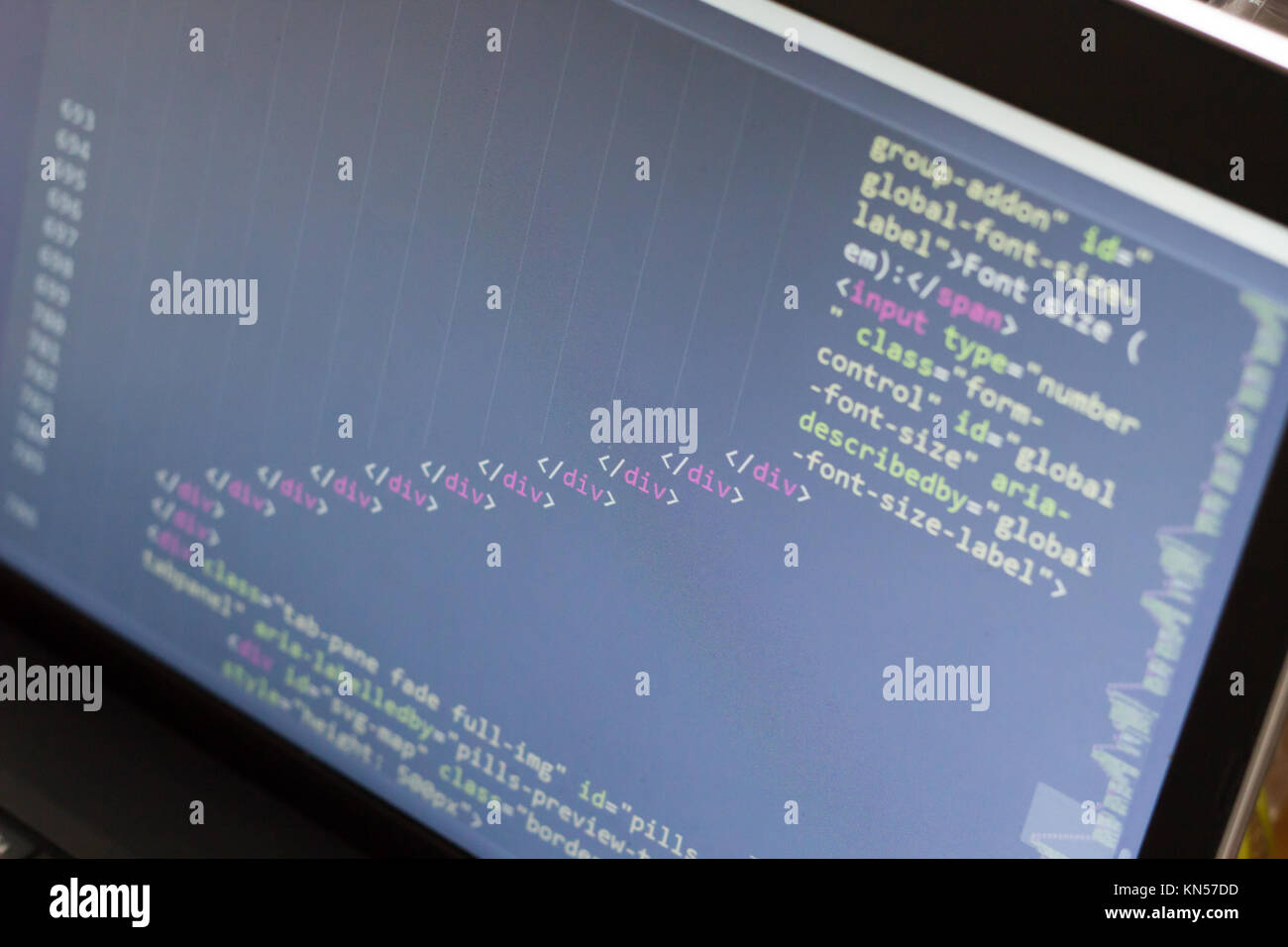 HTML code. Computer programming source code. Abstract screen of web developer. Digital technology modern background. Shallow depth of field Stock Photo