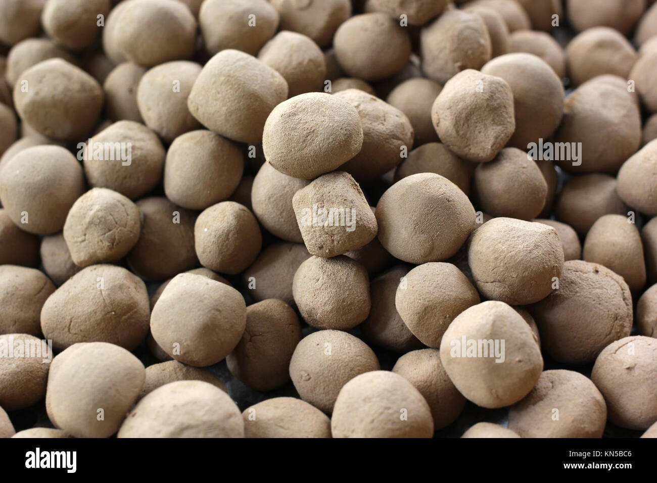 pic What Is Clay Soil Made Of https www alamy com stock image seed balls made of clay soil and seeds 167919814 html