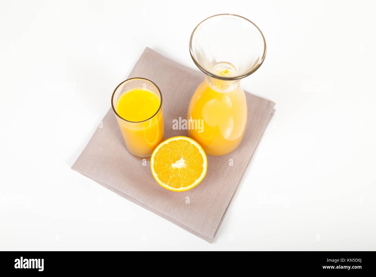 orange juice, carafe, sliced orange. Stock Photo