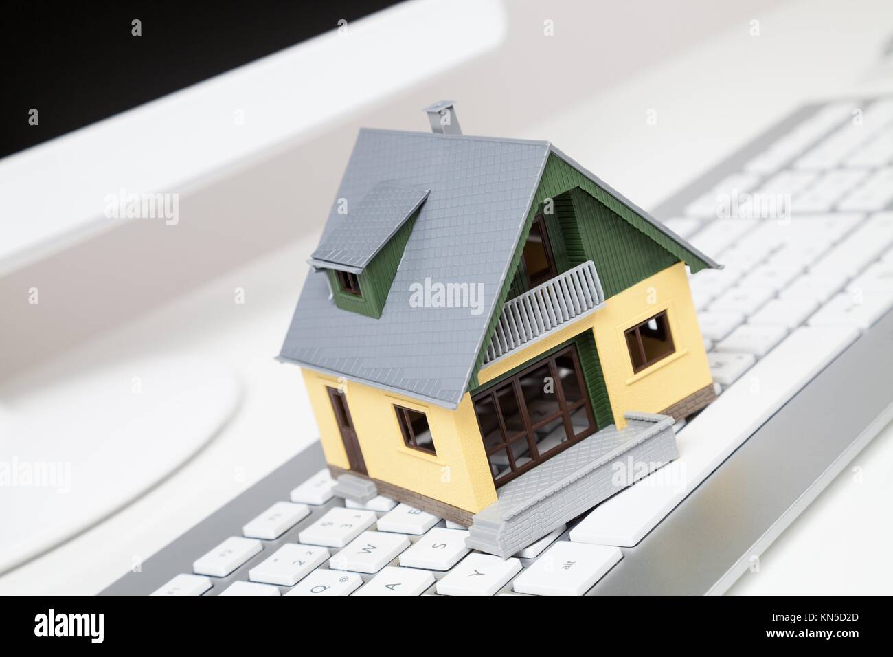 house on a computer keyboard. Stock Photo