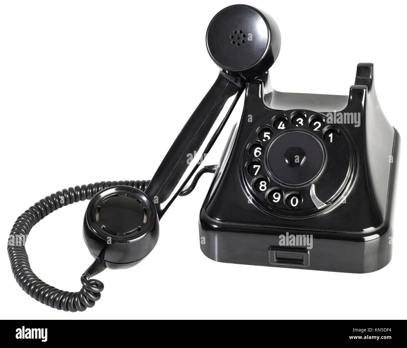 Old Black Bakelite Rotary Phone Isolated on White Background. Stock Photo