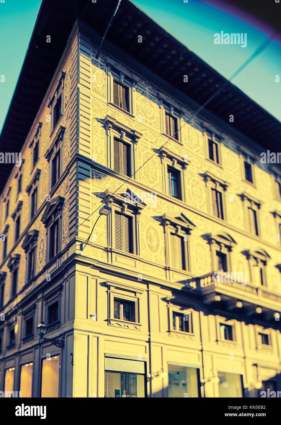 Florentine building facade. Photo executed in a range of ''cross processing''. Stock Photo
