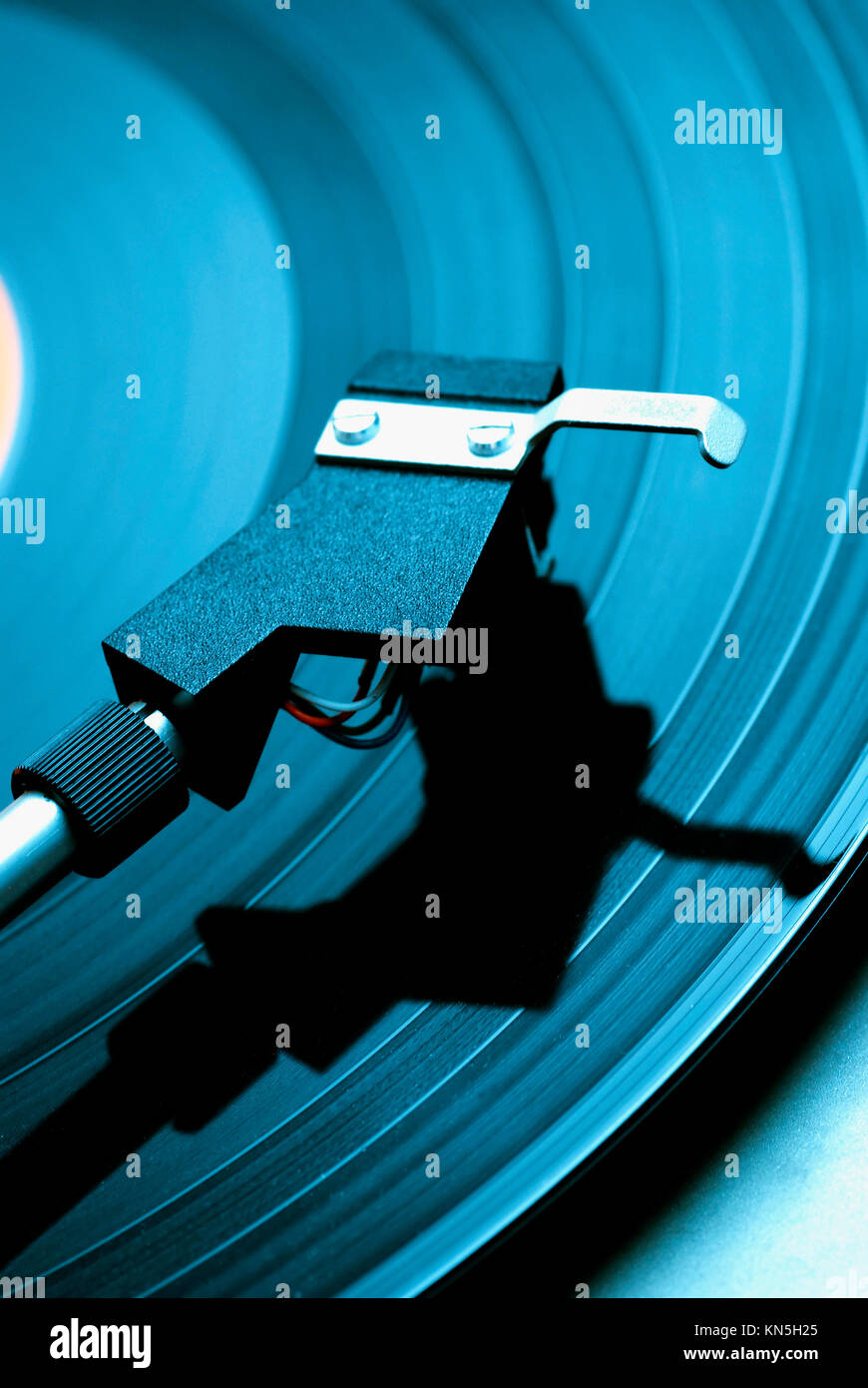 vinyl music record playing on a retro turntable Stock Photo - Alamy
