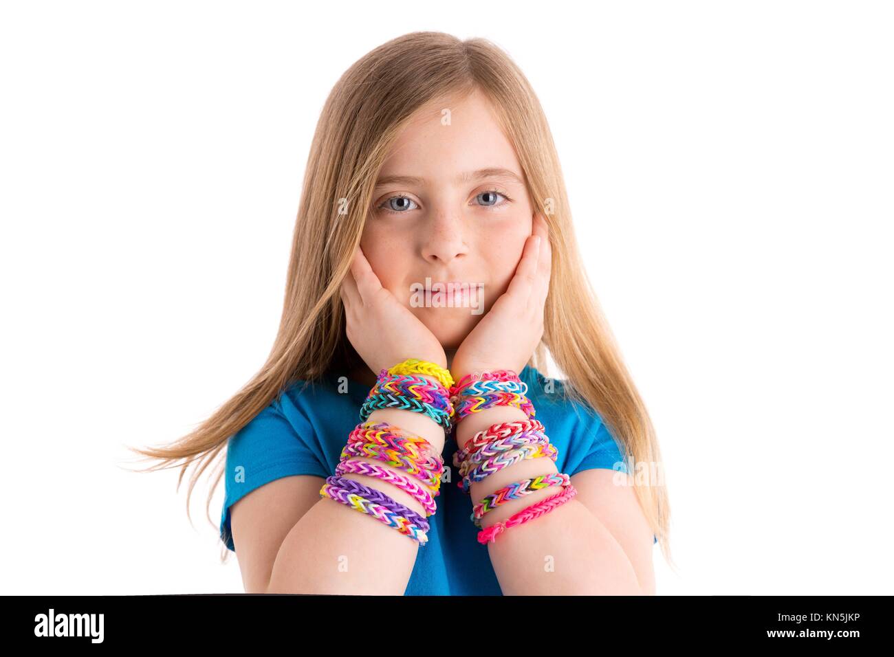 Loom rubber bands bracelets blond kid girl hands on face on white background Stock Photo Alamy