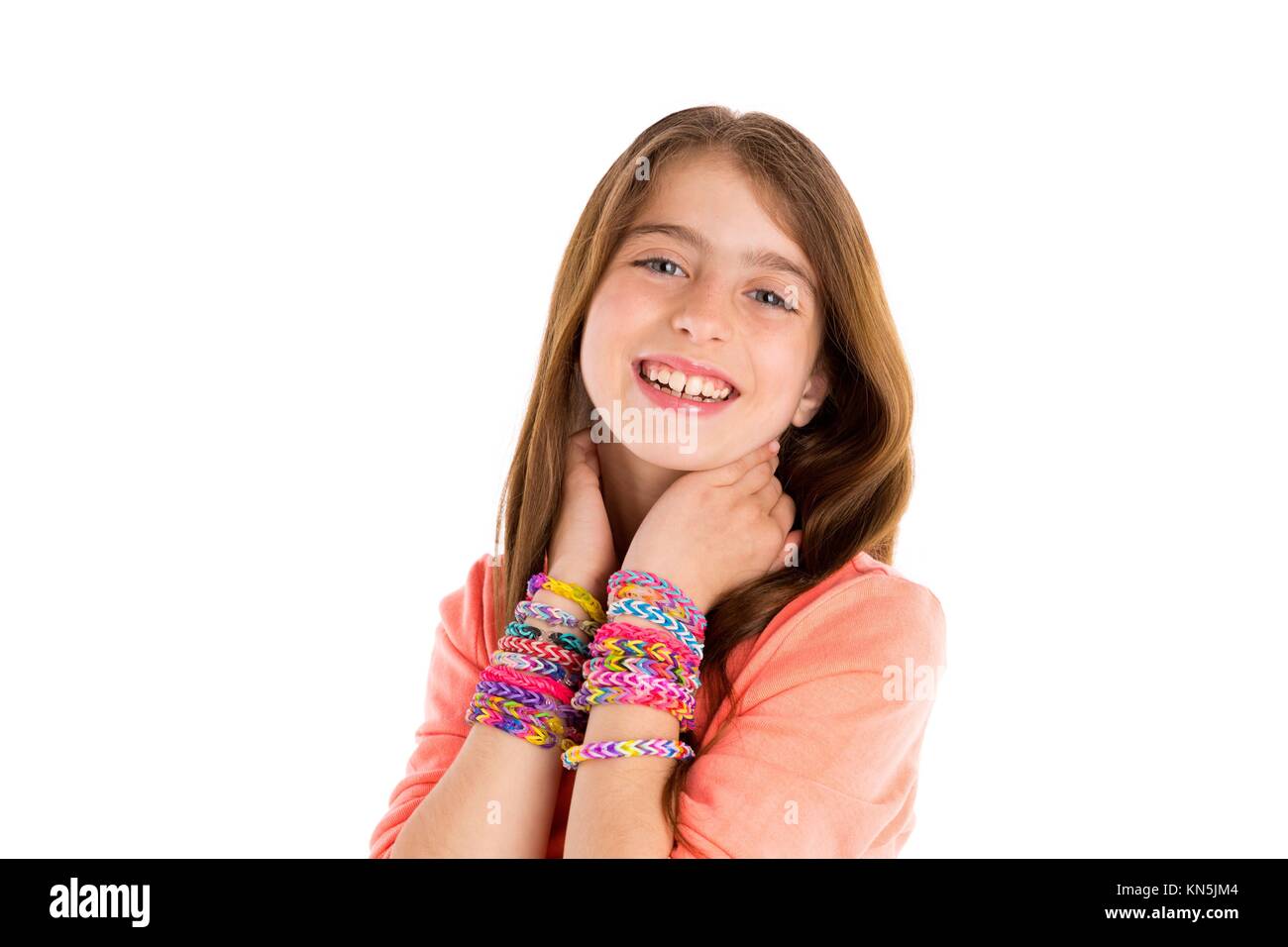 Loom rubber bands bracelets blond kid girl smiling hands in neck on white background Stock Photo